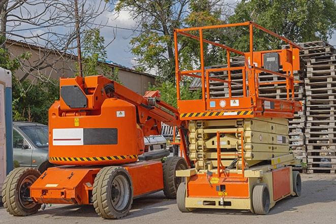 forklift transporting goods in a warehouse setting in Buckner